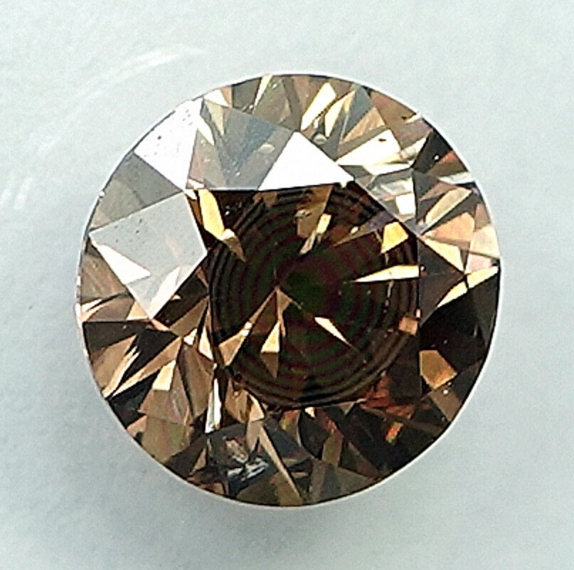 1 pcs Diamond  (Natural coloured)  - 0.70 ct - Round - Fancy intense Yellowish Brown - SI2 - International Gemological Institute (IGI) - Cognac Color #1.0