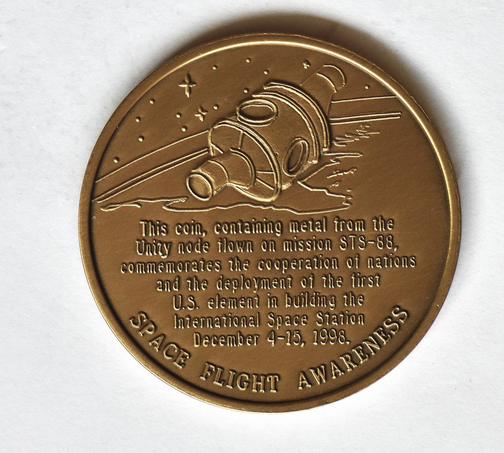 Two medals - containingn metal from Space Shuttle Atlantis, Space Station Mir and TS88 unity node - 1980-1990 #1.0