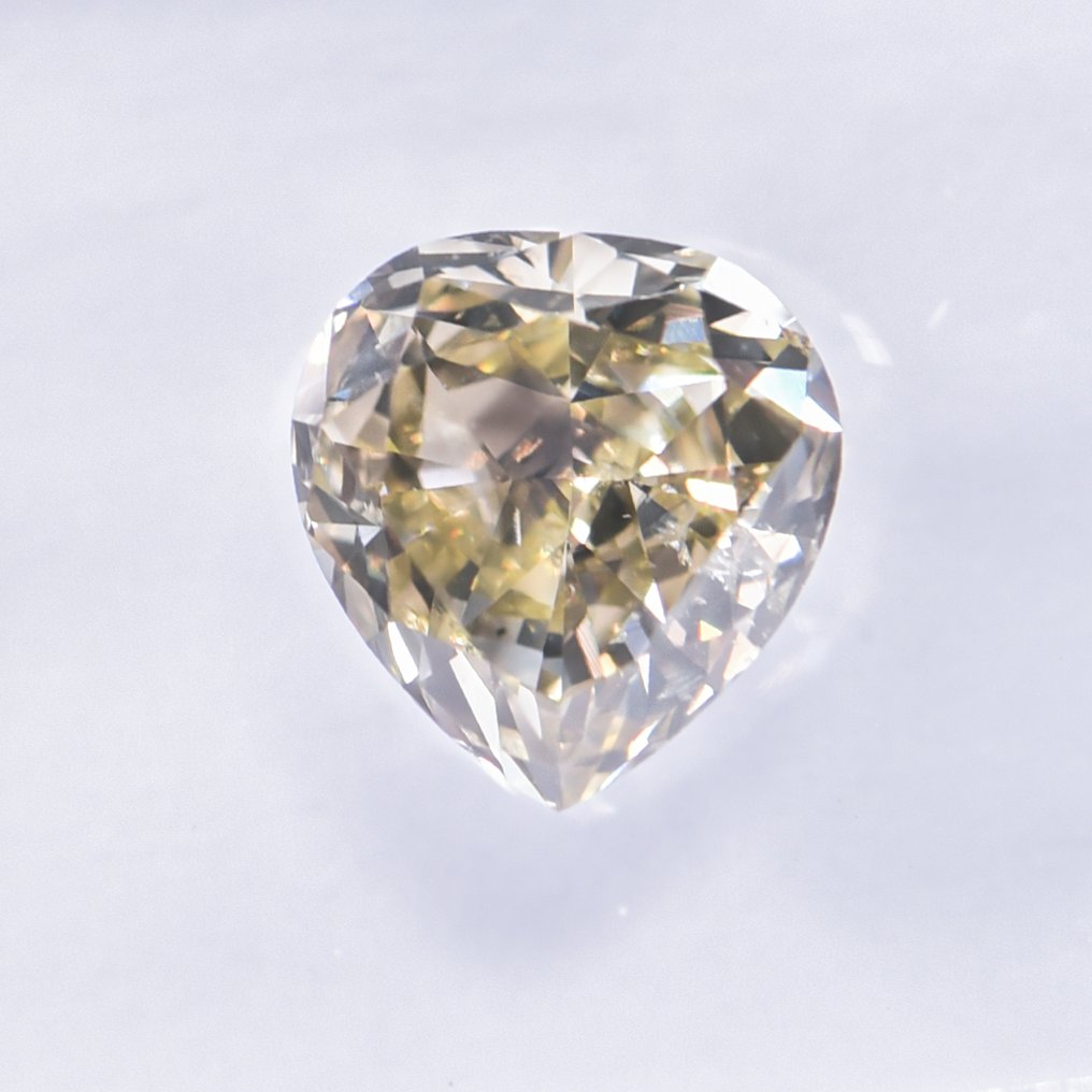 没有保留价 - 1 pcs 钻石  (天然色彩的)  - 1.05 ct - 梨形 - Fancy 稍帶棕色的, 稍帶綠色的 黄色 - SI2 微内含二级 - 国际宝石研究院（IGI） - VG #3.2