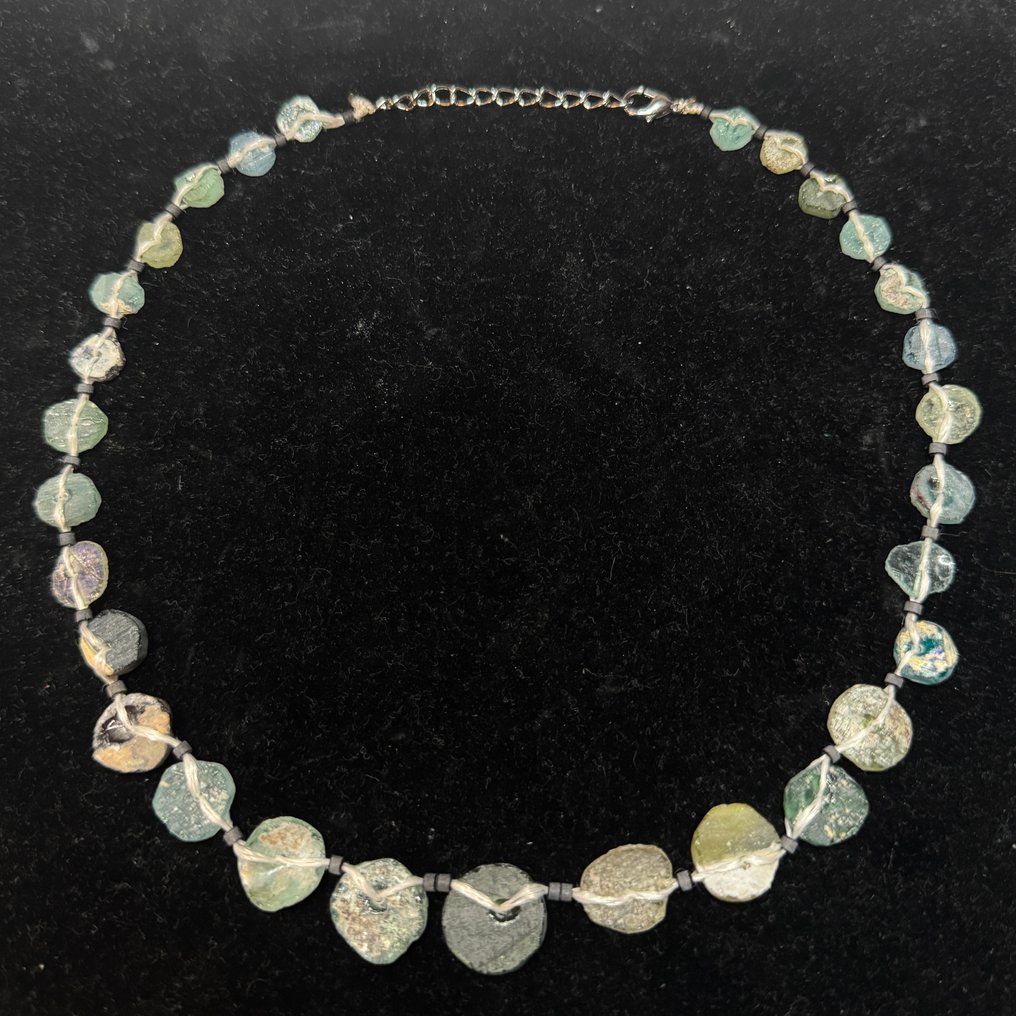 Ancient Roman Ancient Roman glass and stone and other Beads Necklace in Chroome-plated Heart casing ,(100 B.C. -  (No reserve price) #4.3