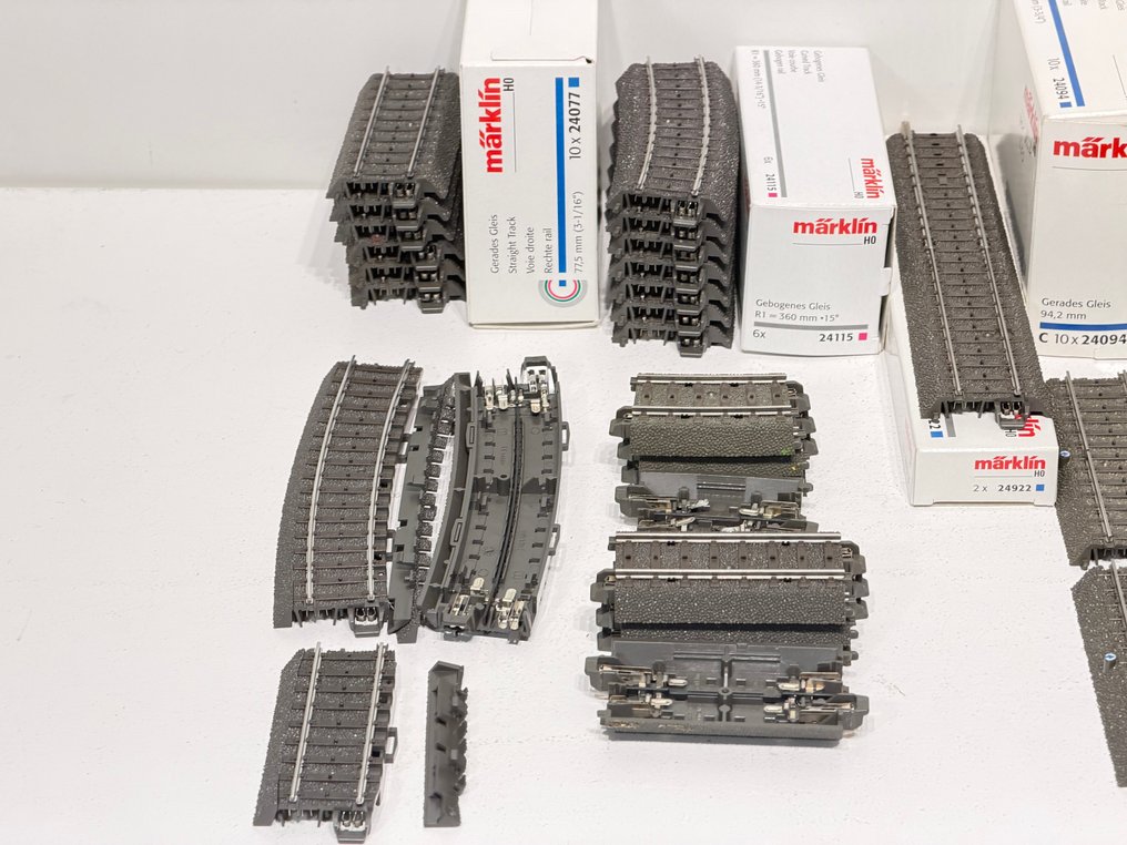 Märklin H0 - 24315,24071,24064,24107,24077,24115,24922,24955,24094,24001,24207,24215 - Model train tracks (50) - C-Rails spacers, bump blocks #1.0