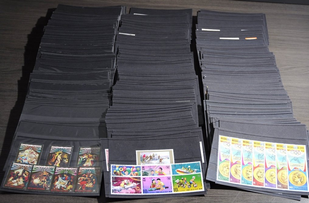 Wereld - Flinke partij met o.a. diverse landen, thema's, series, blokken en meer op zo'n 370 insteekkaarten #1.0