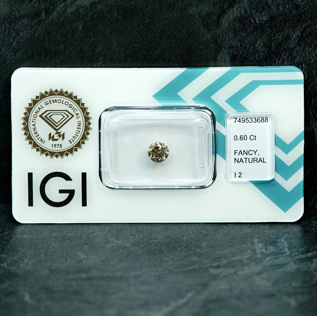 Ei pohjahintaa - 1 pcs Timantti  (Luonnonvärinen)  - 0.60 ct - Pyöreä - Fancy light Rusehtava Keltainen - I2 - Kansainvälinen gemologinen instituutti (IGI) #1.0