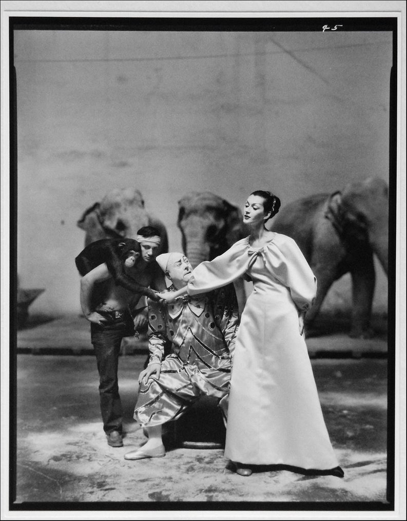 Richard Avedon (1923–2004) - Dovima with Emilien Bouglione and a clown,  gown by Hubert de Givenchy.  Cirque d’Hiver, Paris, #1.0