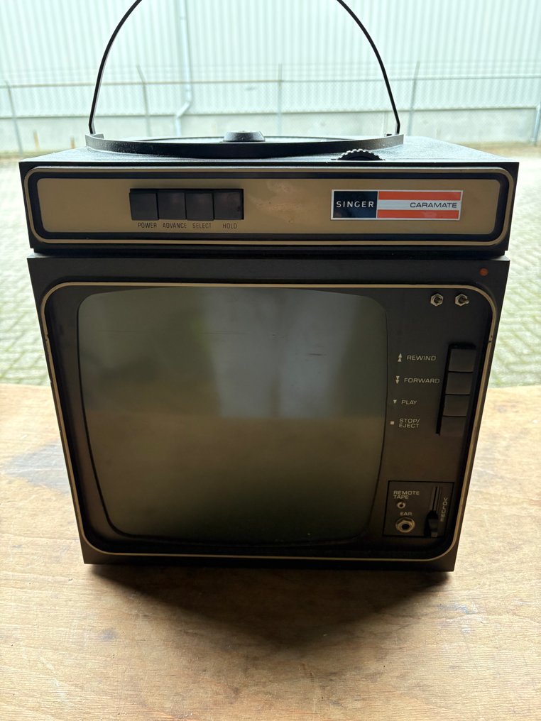 Singer Caramate, één van de vroegste draagbare Slide projector #1.0