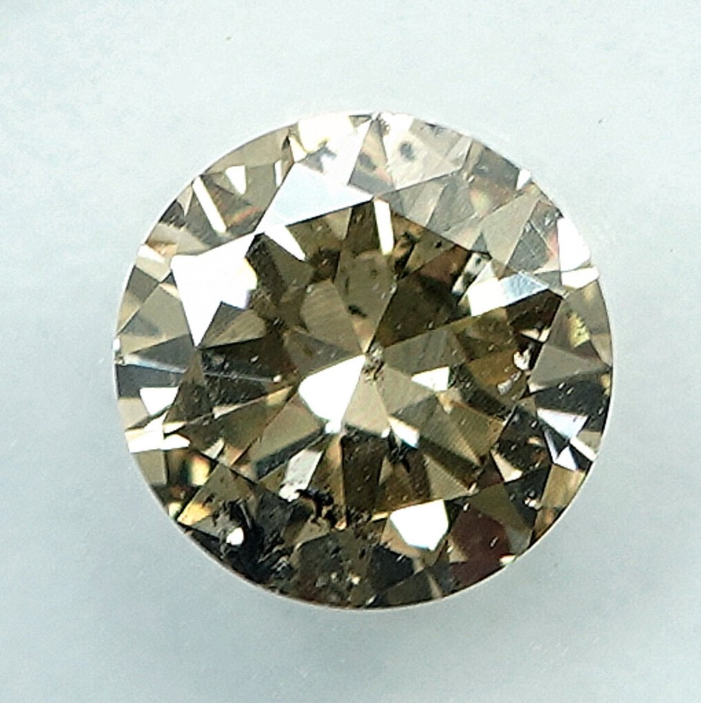 没有保留价 - 1 pcs 钻石  (天然色彩的)  - 0.72 ct - 圆形 - Fancy light 稍帶棕色的 黄色 - I2 内含二级 - 国际宝石研究院（IGI） #1.0