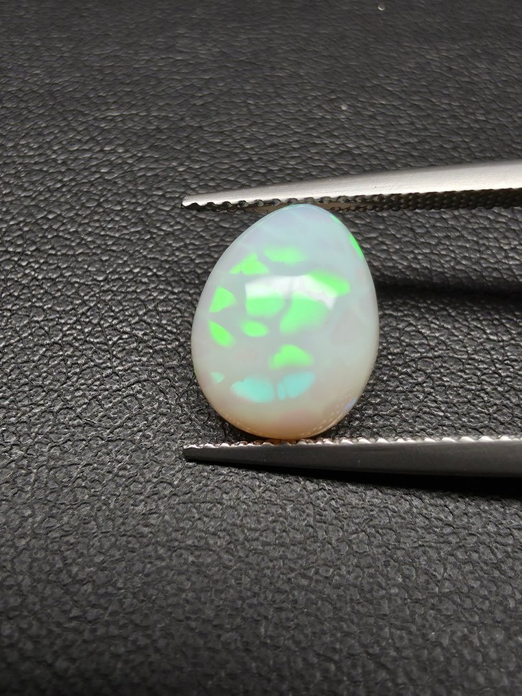 3.28ct Natural Opal Cabochon - Height: 12 mm - Width: 9.4 mm- 0.66 g #2.1