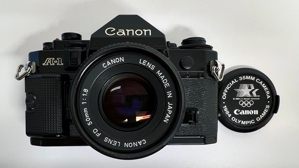 Canon A-1 + FD 1,8/50mm | Αντανακλαστική φωτογραφική μηχανή με μονό φακό (TLR) #1.0