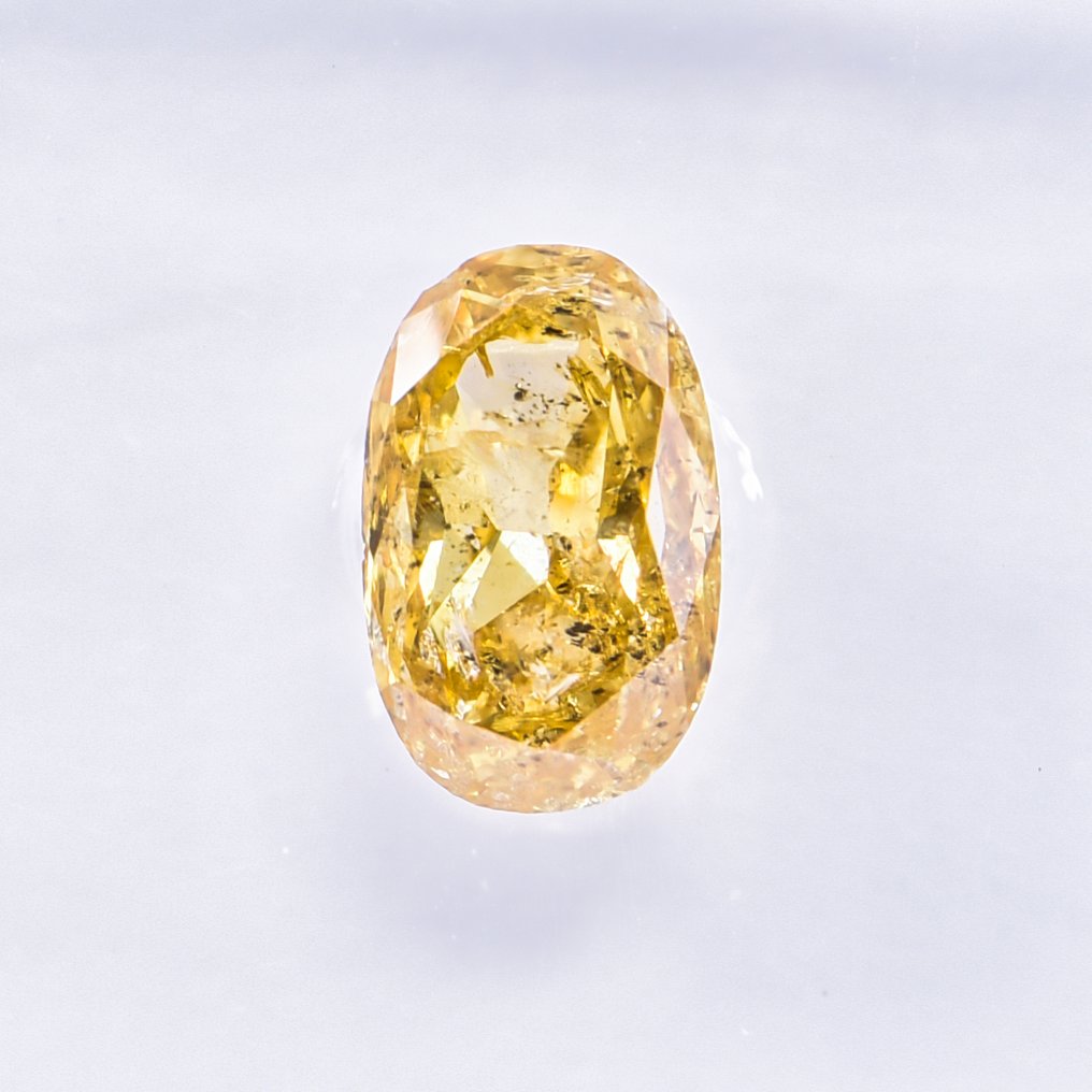 Sans prix de réserve - 1 pcs Diamant (Couleur naturelle) - 0.68 ct - Oval - Fancy vivid Jaune - I1 - International Gemological Institute (IGI) - VG #3.2