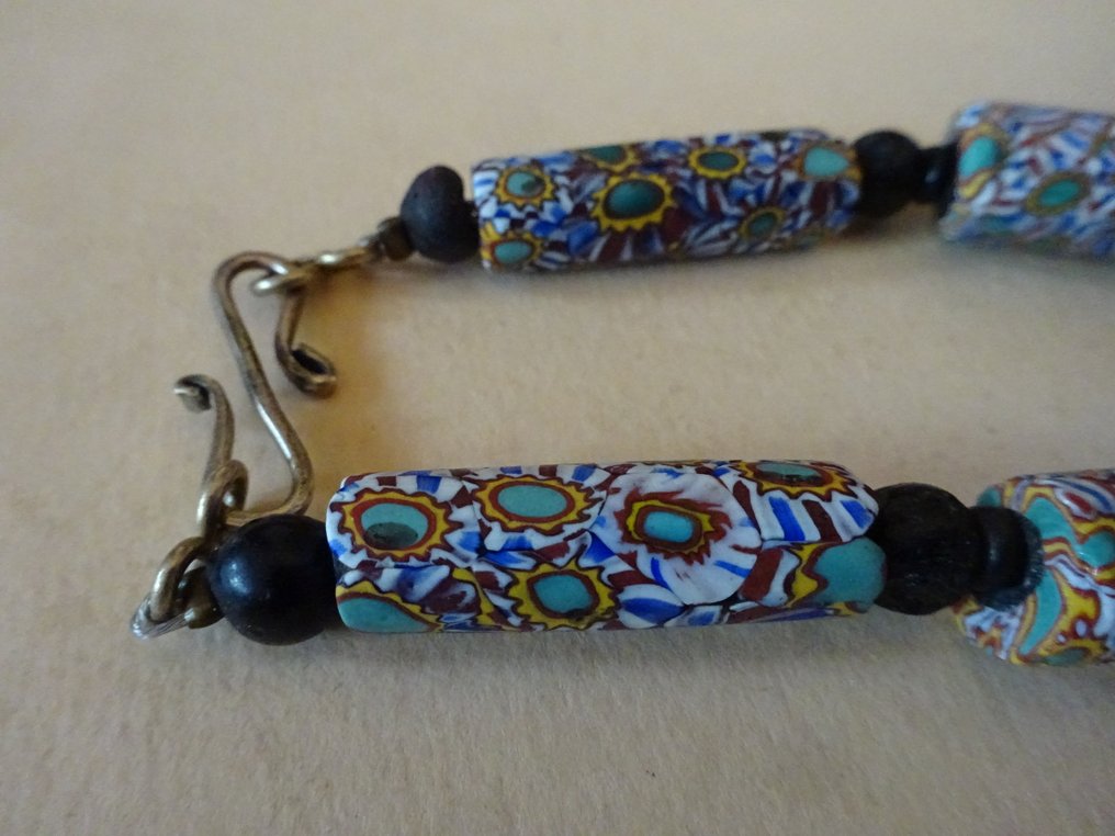Necklace of 11 Murano beads, Millefiori / Mosaic type, circa 1910 - 1920, Ghana #1.0
