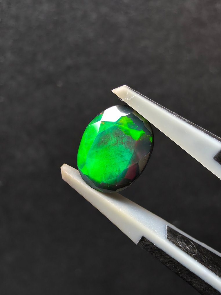 1.54 克拉 黑色欧泊 多面 - 高度: 9.2 mm - 闊度: 7.2 mm- 0.31 g #1.0