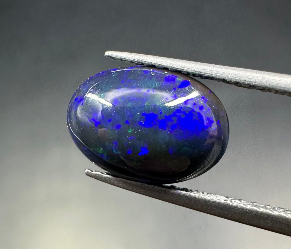 3,07ct Opaal Cabochon- 0.61 g - (2) #4.3