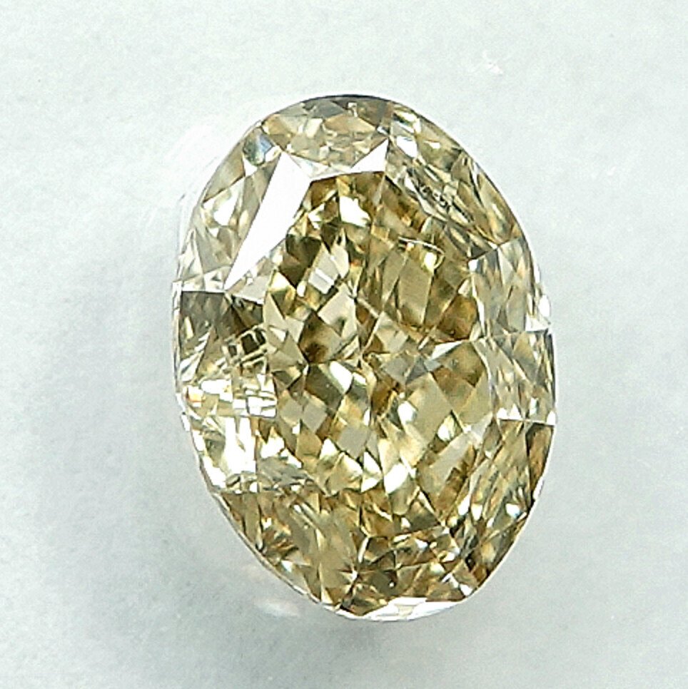 1 pcs 钻石  (天然色彩的)  - 0.81 ct - 椭圆形 - Fancy light 黄色 - VVS2 极轻微内含二级 - 国际宝石研究院（IGI） #2.1