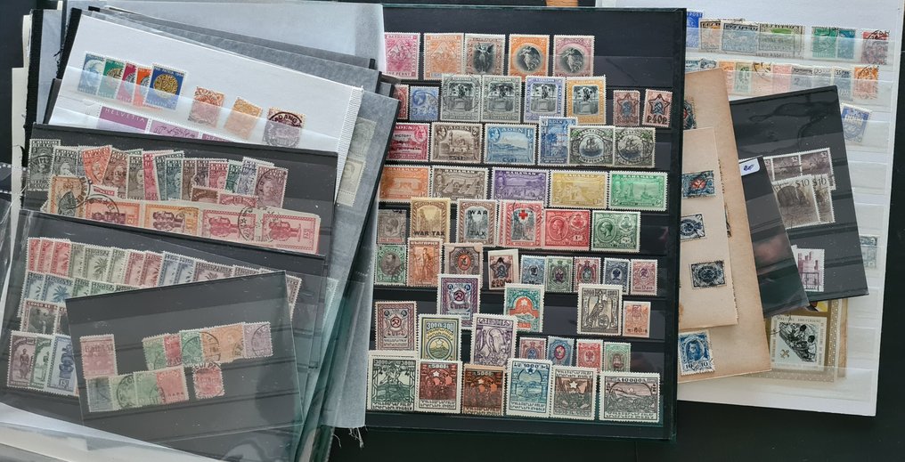 世界  - b42）查找世界邮票批次，涵盖多个国家，展示在38张照片中 #1.0