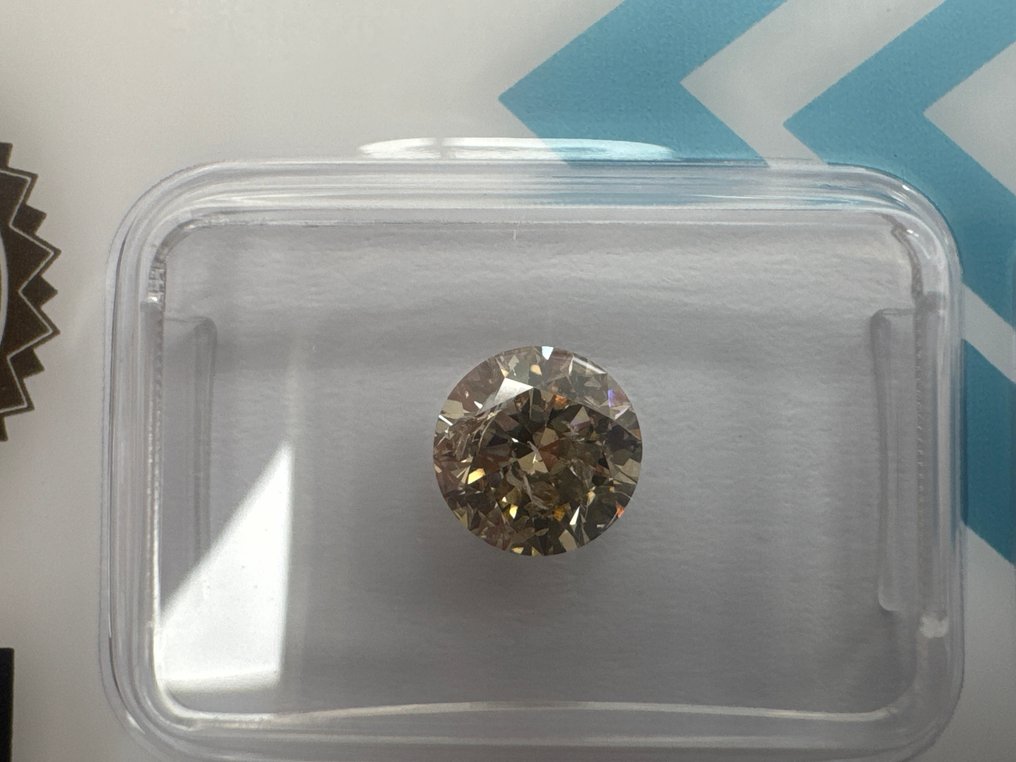 Zonder minimumprijs - 1 pcs Diamant  (Natuurlijk gekleurd)  - 1.09 ct - Rond - Fancy Bruin, Geel - P1 - International Gemological Institute (IGI) #1.0