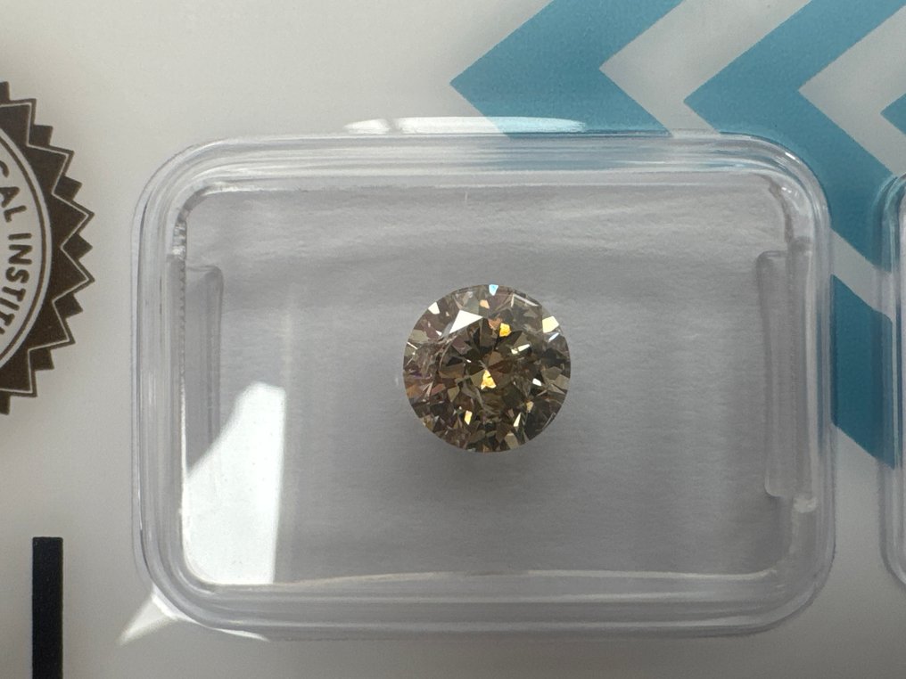 Zonder minimumprijs - 1 pcs Diamant  (Natuurlijk gekleurd)  - 1.09 ct - Rond - Fancy Bruin, Geel - P1 - International Gemological Institute (IGI) #3.2