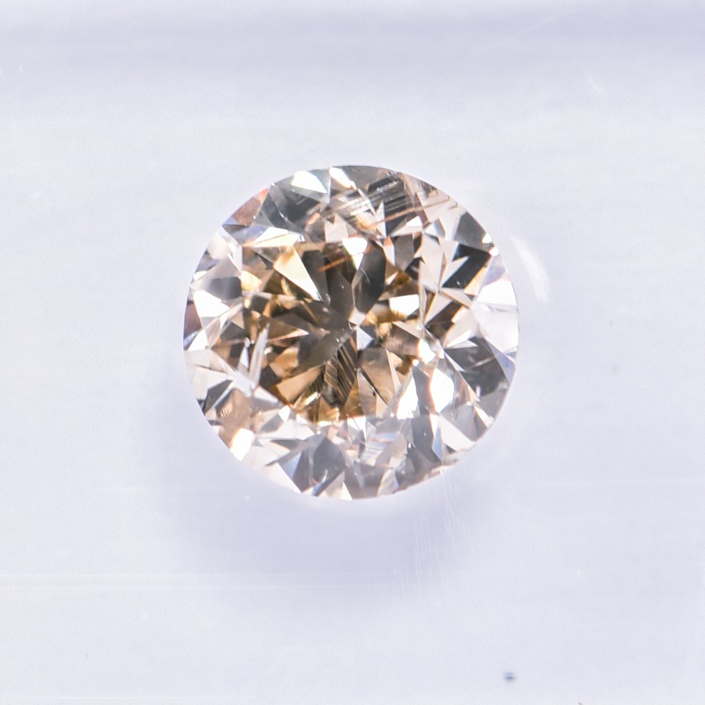 Fără preț de rezervă - 1 pcs Diamant  (Colorat natural)  - 1.03 ct - Rotund - Fancy Galben Maro - I1 - IGI (Institutul gemologic internațional) - VG #3.2