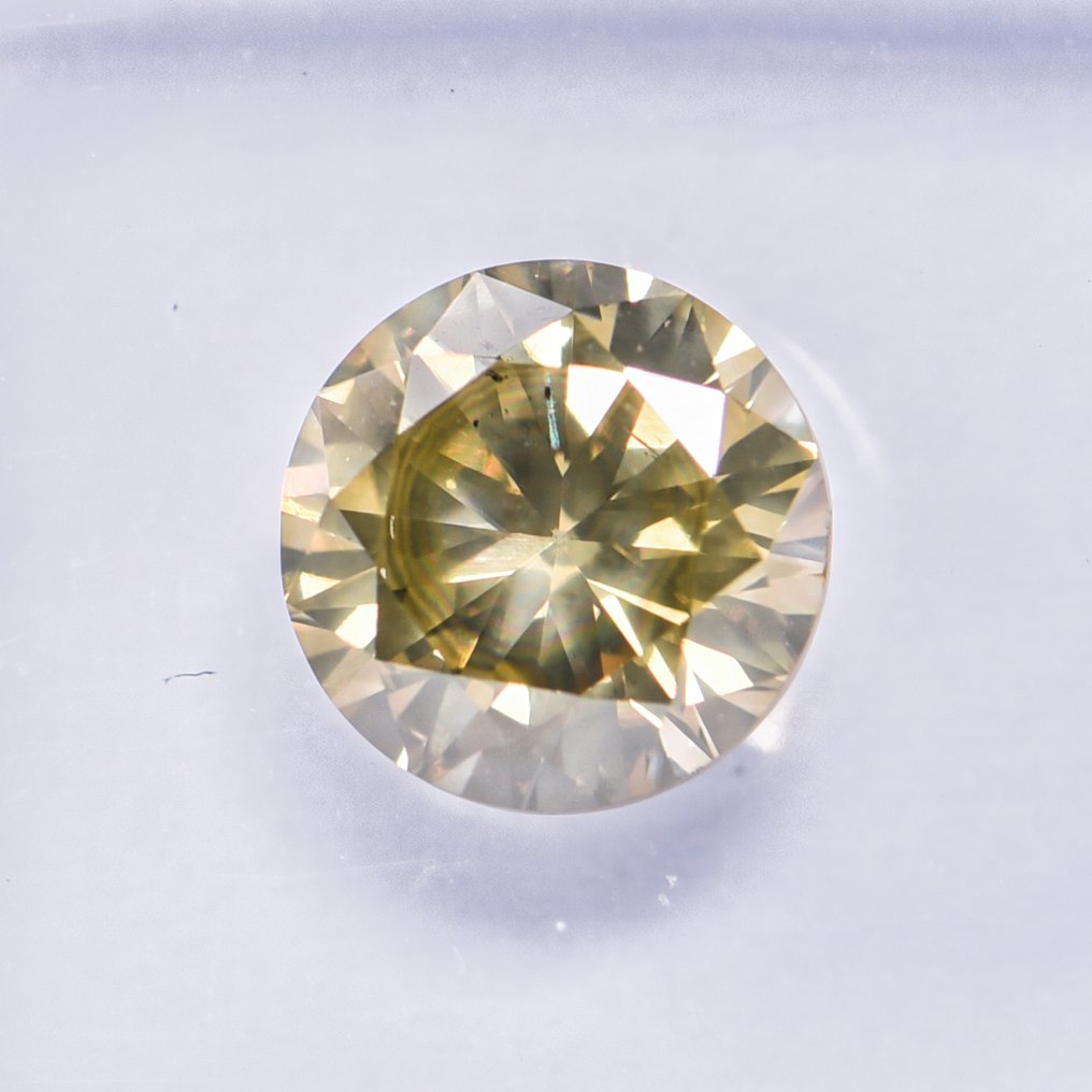 没有保留价 - 1 pcs 钻石  (天然色彩的)  - 1.08 ct - 圆形 - Fancy 稍帶綠色的 黄色 - SI2 微内含二级 - 国际宝石研究院（IGI） - VG #1.0