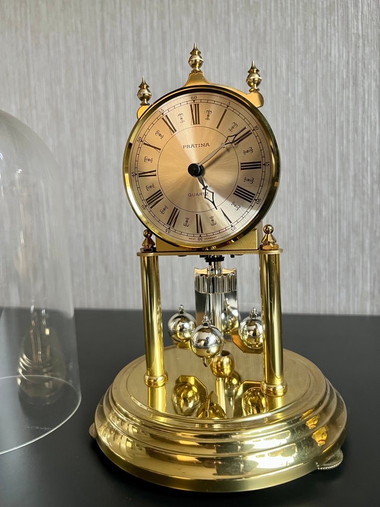 Επιτραπέζια ρολόγια και ρολόγια γραφείου -   πλαστικό μπρούντζο - 1970-1980 - Κλουκί σε περίβλημα #2.1