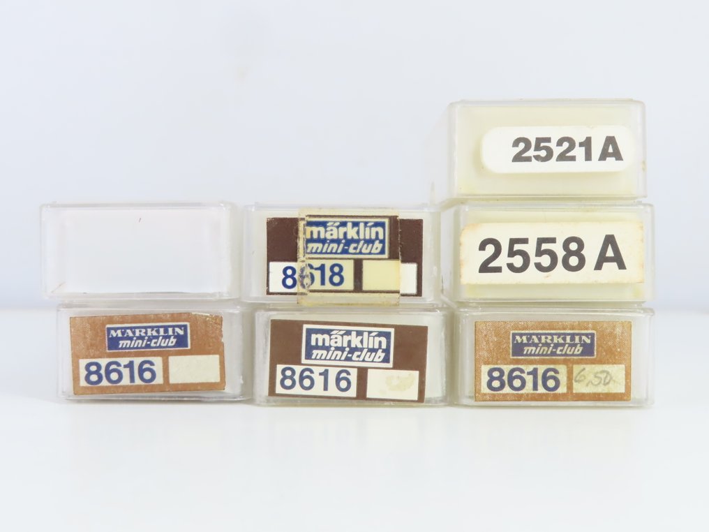 Märklin Z - 2521A/2558A/8616/8618 - Godsvagn-set för modelltåg (7) - 7x 2-axlad containerdraagwagen med containrarna 'Mexico', 'Sealand' och 'Märklin'. - DB #2.1