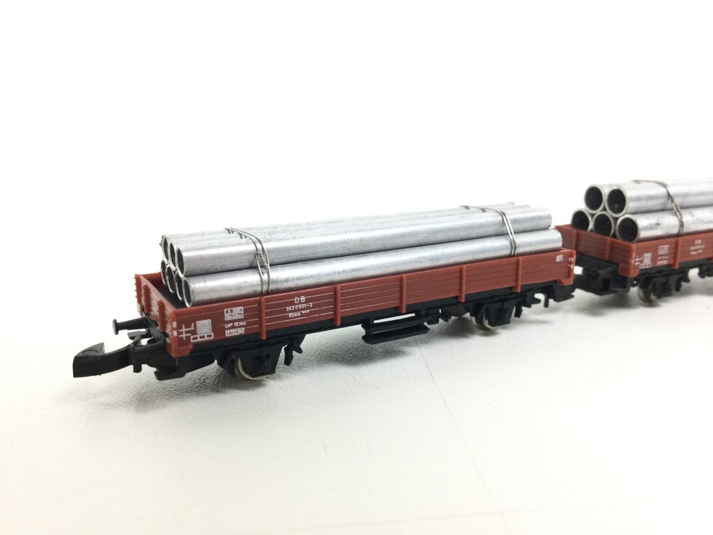Märklin Z - 8610/8609 - Model train freight carriage (7) - Six low-sided wagons with attractive cargo plus a closing wagon. - DB #1.0
