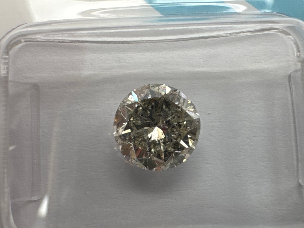 χωρίς τιμή ασφαλείας - 1 pcs Διαμάντι (Φυσικού χρώματος) - 1.51 ct - Στρογγυλό - Light Κίτρινο - I1 - International Gemological Institute (IGI) - U-V #1.0