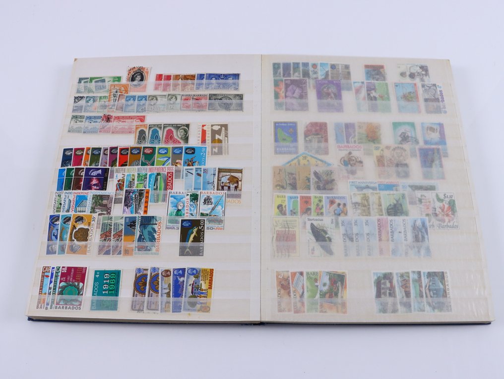 Newfoundland, Barbados, Cyprus & Guadeloupe  - Collection of different countries in a stock album. #4.3