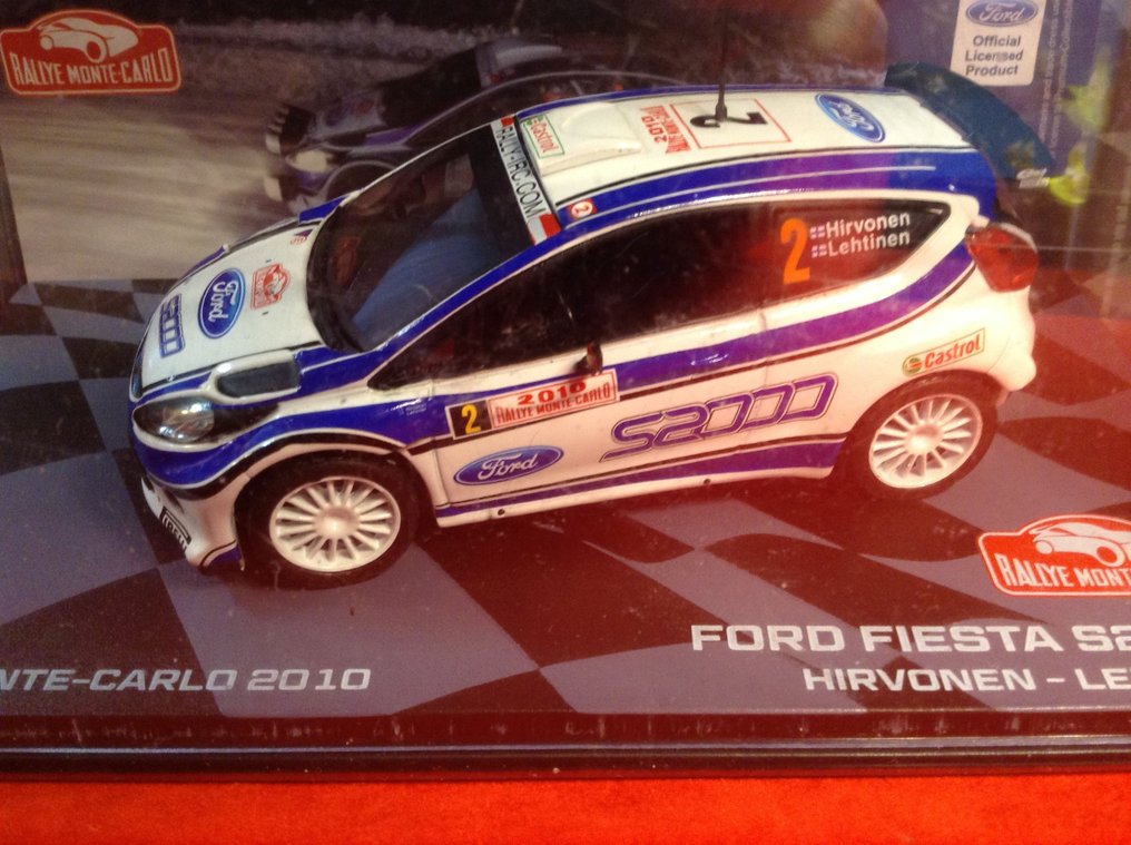 Kiosk - Ralky Series 1:43 - Rennwagenmodell  (4) - 1) Toyota Celica GT-4 Rally Le Touquet 2010 #11 Tanghe/Squedin - 2) Ford Fiesta S2000 1° Rally MC - 3) Ford Fiest RS WRC 1. Rallye Schweden 2011 #3 Hirvonen - 4) Citroen DS3 R3 Rally Monte Carlo 2011 #2.1