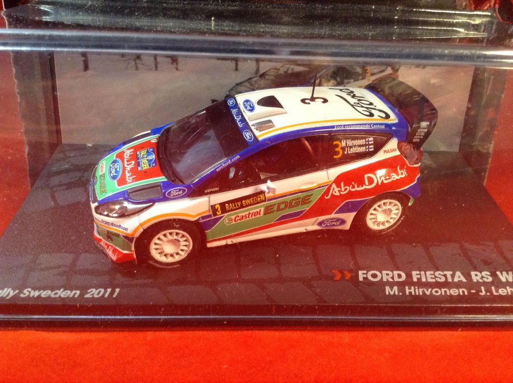 Kiosk - Ralky Series 1:43 - Rennwagenmodell  (4) - 1) Toyota Celica GT-4 Rally Le Touquet 2010 #11 Tanghe/Squedin - 2) Ford Fiesta S2000 1° Rally MC - 3) Ford Fiest RS WRC 1. Rallye Schweden 2011 #3 Hirvonen - 4) Citroen DS3 R3 Rally Monte Carlo 2011 #4.3