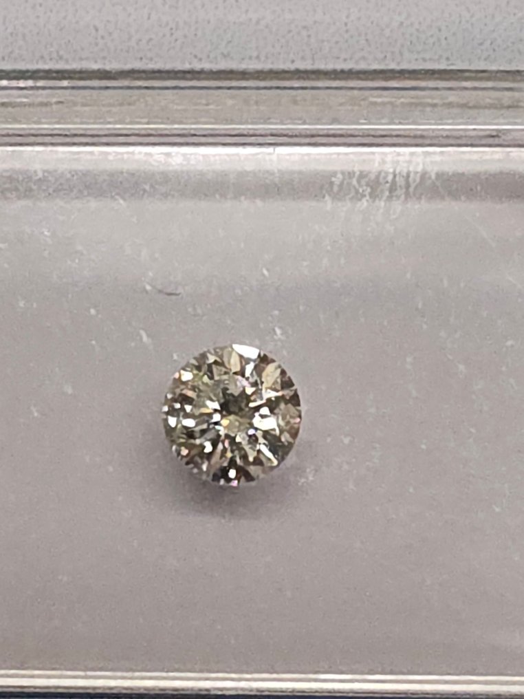 沒有保留價 - 1 pcs 鑽石  (天然)  - 0.31 ct - 圓形 - J(極微黃、從正面看是亮白色) - VS2 - HRD Antwerp #2.1