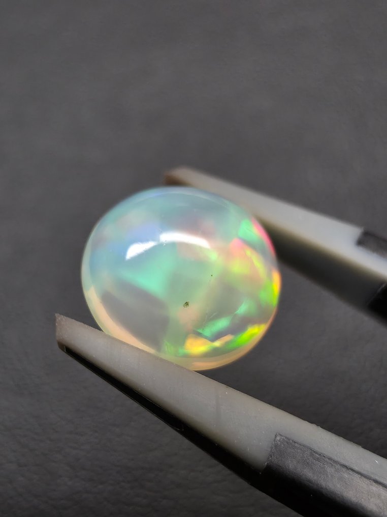2,63 ct natürlicher weißer Opal Cabochon - Höhe: 10 mm - Breite: 9.8 mm- 0.53 g #1.0