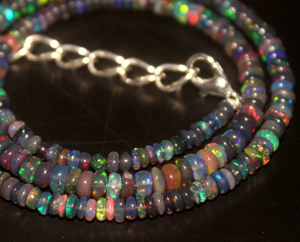 52,7 ct - luonnollinen musta opaal Helmet- 10.54 g #2.1