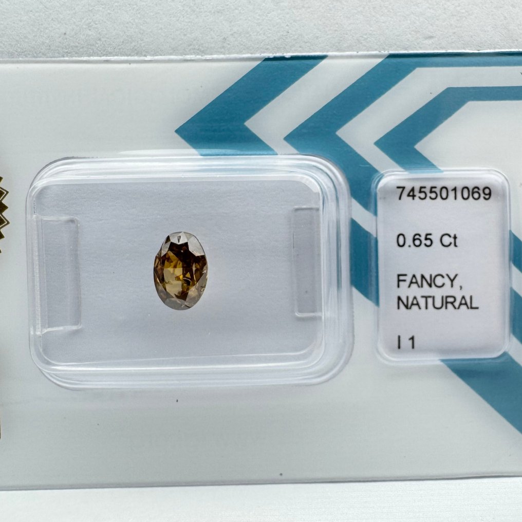 没有保留价 - 1 pcs 钻石  (天然色彩的)  - 0.65 ct - 椭圆形 - Fancy deep 棕色 黄色 - I1 内含一级 - 国际宝石研究院（IGI） #1.0