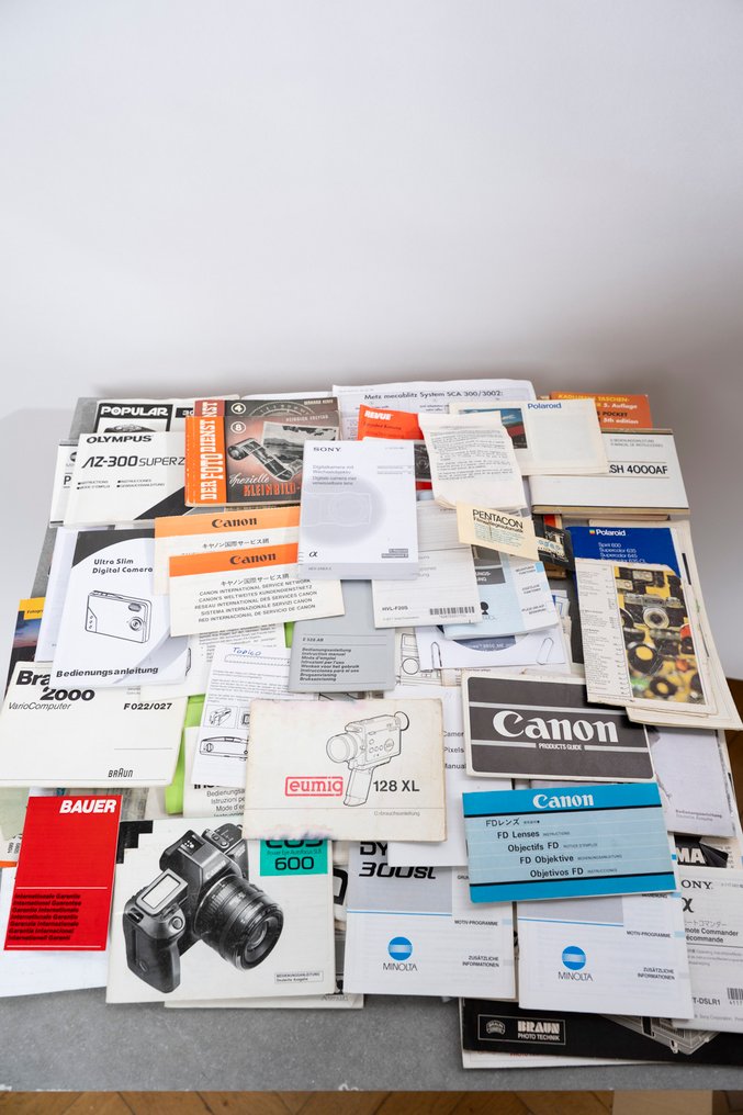 Kodak, Minolta, Pentax, Agfa, ORWO, Bauer, Polaroid, Panasonic, Canon, Bolex, Sony, Sigma, Metz, Braun, Olympus camera manuals and brochures Analogt kamera #1.0