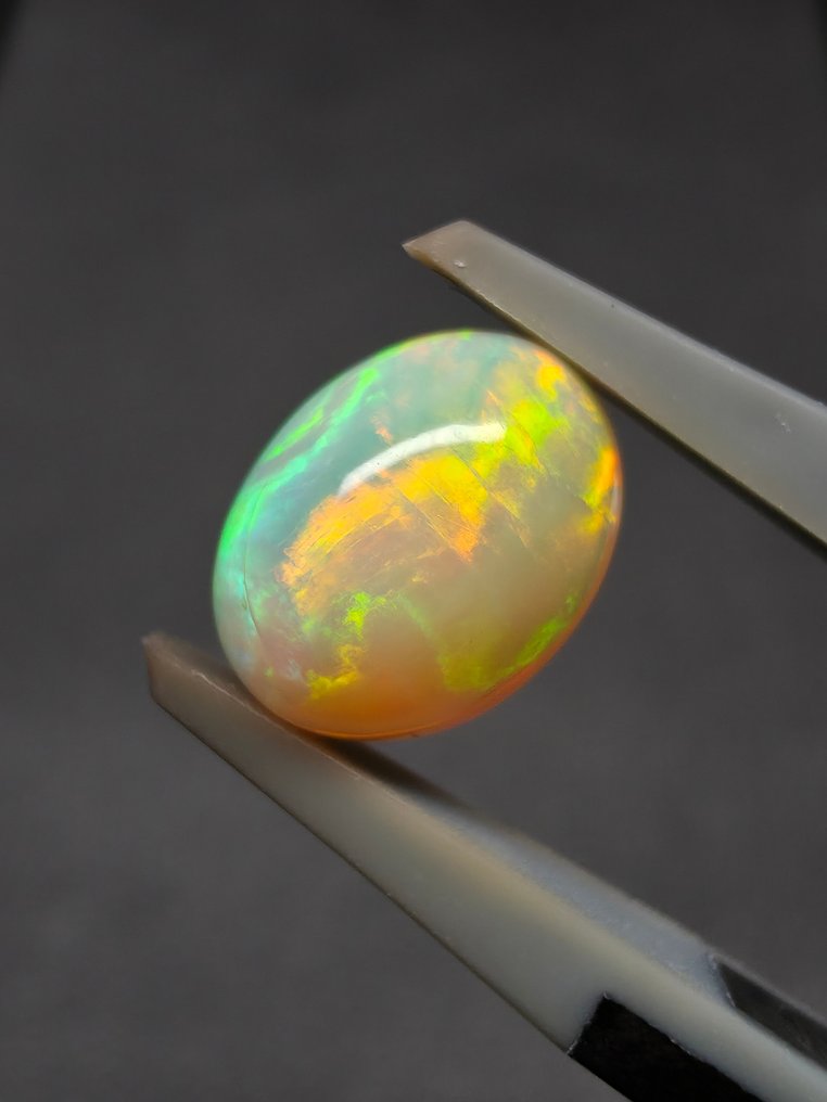 1,57 ct természetes fehér opál Cabochon- 0.31 g #3.2