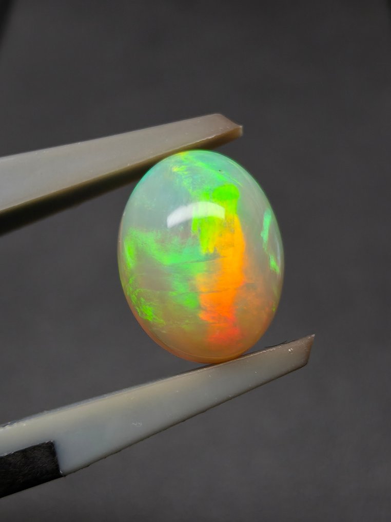 1,57 ct természetes fehér opál Cabochon- 0.31 g #1.0