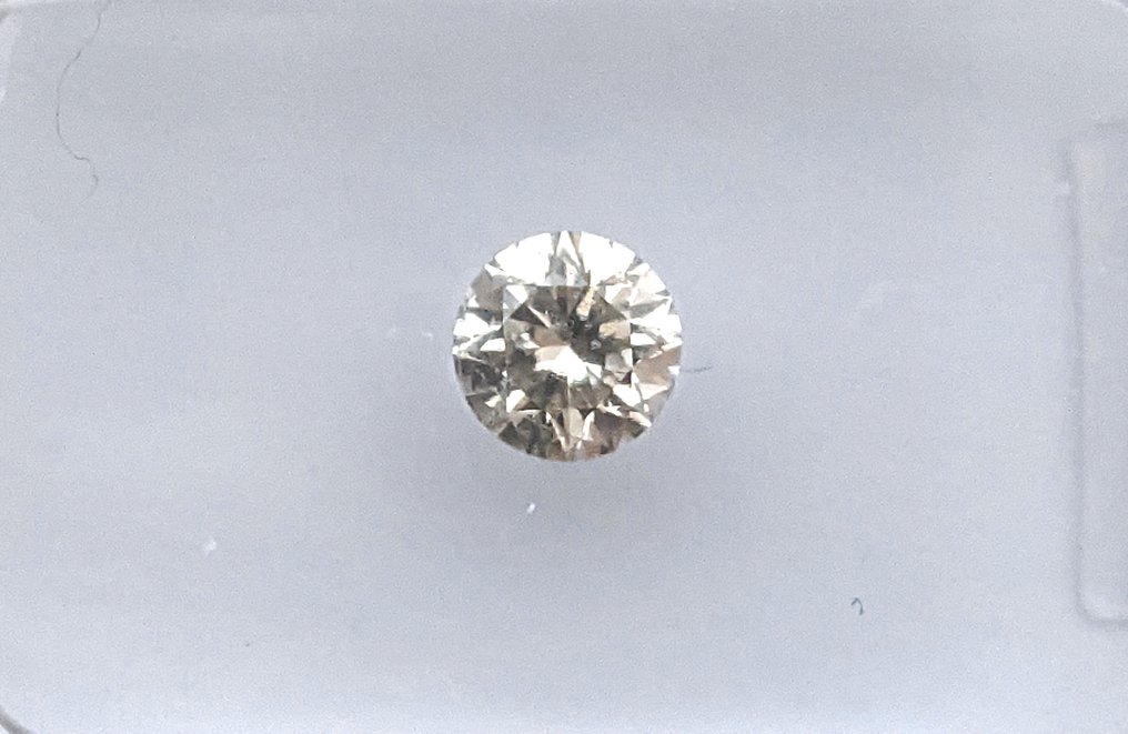 没有保留价 - 1 pcs 钻石  (天然色彩的)  - 0.38 ct - 圆形 - Fancy light 稍帶棕色的, 稍帶綠色的 黄色 - SI1 微内含一级 - 国际宝石研究院（IGI） #1.0