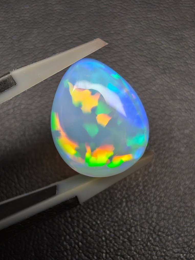 4,83 ct naturlig vit opal Cabochon- 0.92 g #1.0