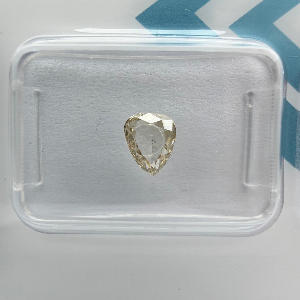 Bez ceny minimalnej
 - 1 pcs Diament  (W kolorze naturalnym)  - 0.60 ct - gruszkowy - Light Brązowawy Żółty - SI1 (z nieznacznymi inkluzjami) - International Gemological Institute (IGI) #3.2