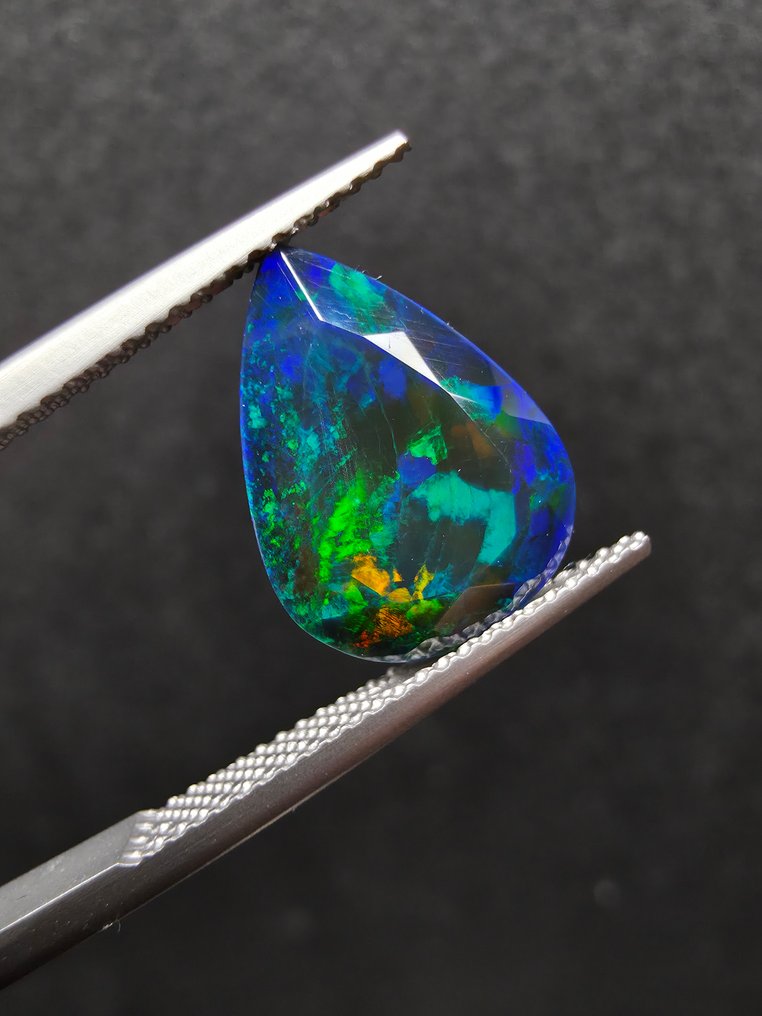 2.69克拉黑色欧泊 多面 - 高度: 14.6 mm - 闊度: 10.8 mm- 0.54 g #1.0