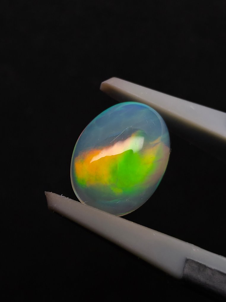 1.53克拉天然白色欧泊 弧面形 - 高度: 9.9 mm - 闊度: 7.5 mm- 0.31 g #1.0