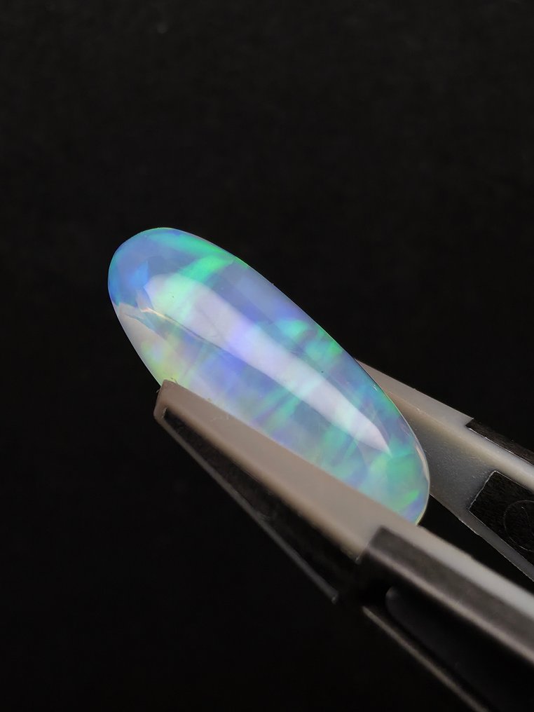 4.31克拉天然白色欧泊 弧面形 - 高度: 19 mm - 闊度: 7.8 mm- 0.86 g #3.2