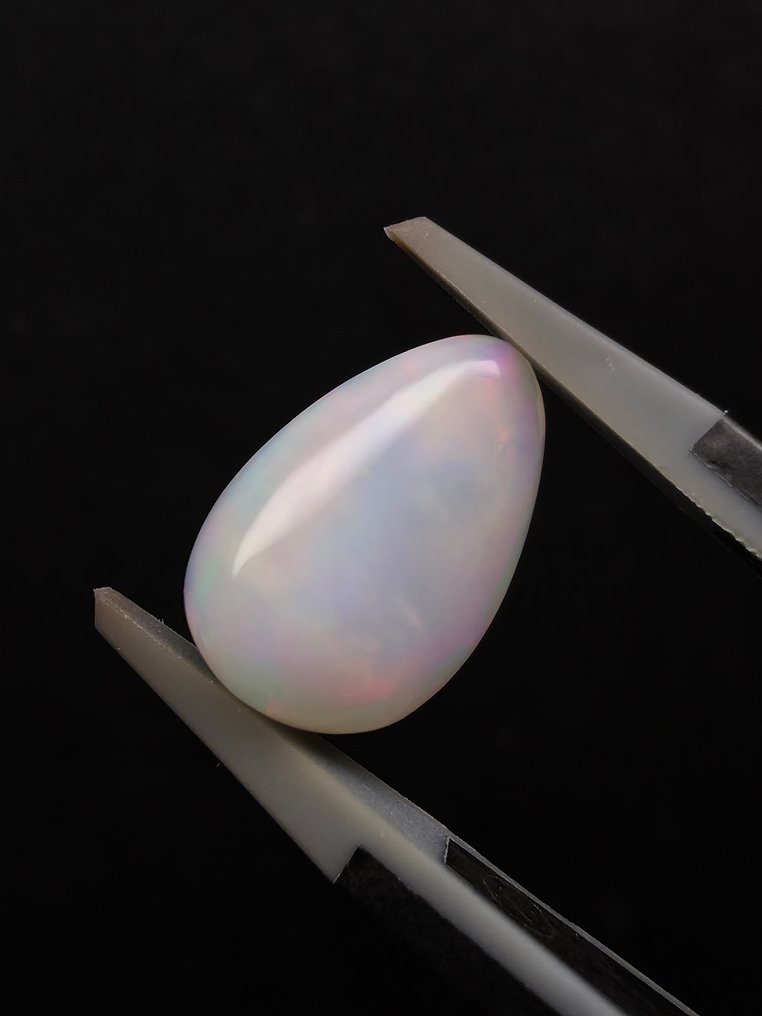 2.71克拉天然白色欧泊 弧面形 - 高度: 13.4 mm - 闊度: 9 mm- 0.54 g #2.1