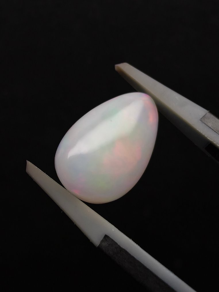 2.71克拉天然白色欧泊 弧面形 - 高度: 13.4 mm - 闊度: 9 mm- 0.54 g #1.0