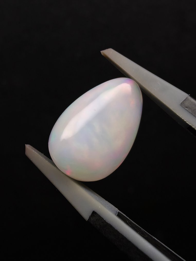 2.71克拉天然白色欧泊 弧面形 - 高度: 13.4 mm - 闊度: 9 mm- 0.54 g #3.2