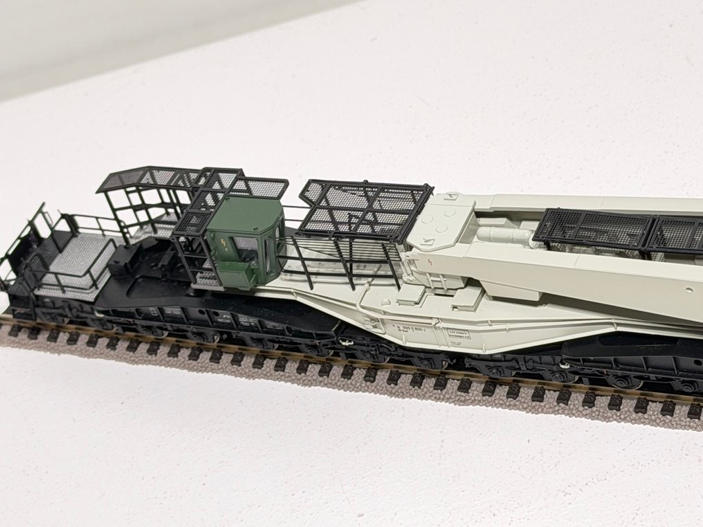 Trix H0 - 23994 - 模型火車車廂 (1) - 32轴平板车配支臂，长度720米 - DB #4.3