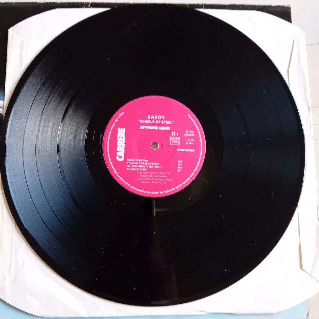 Saxon - Strong arm of the law   /    Wheels of steel - LP-album (flera objekt) - Stereo - 1980 #4.3