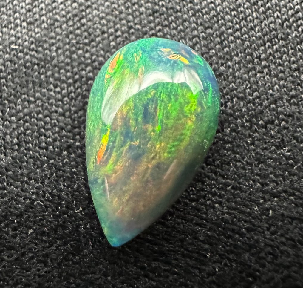 1,64ct Opaal Gepolijste- 0.32 g #3.2