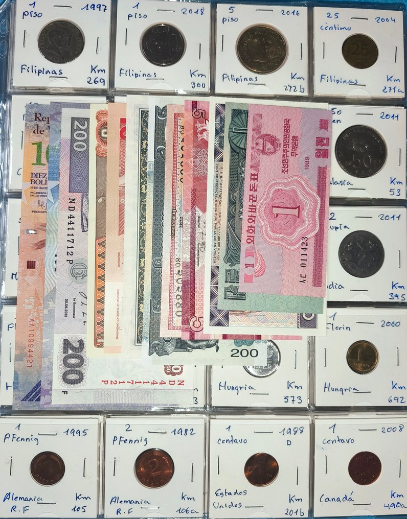 世界上有166枚来自54个国家的硬币，以及12张UNC品质的钞票。时期为1900-2000年。.  (没有保留价) #1.0