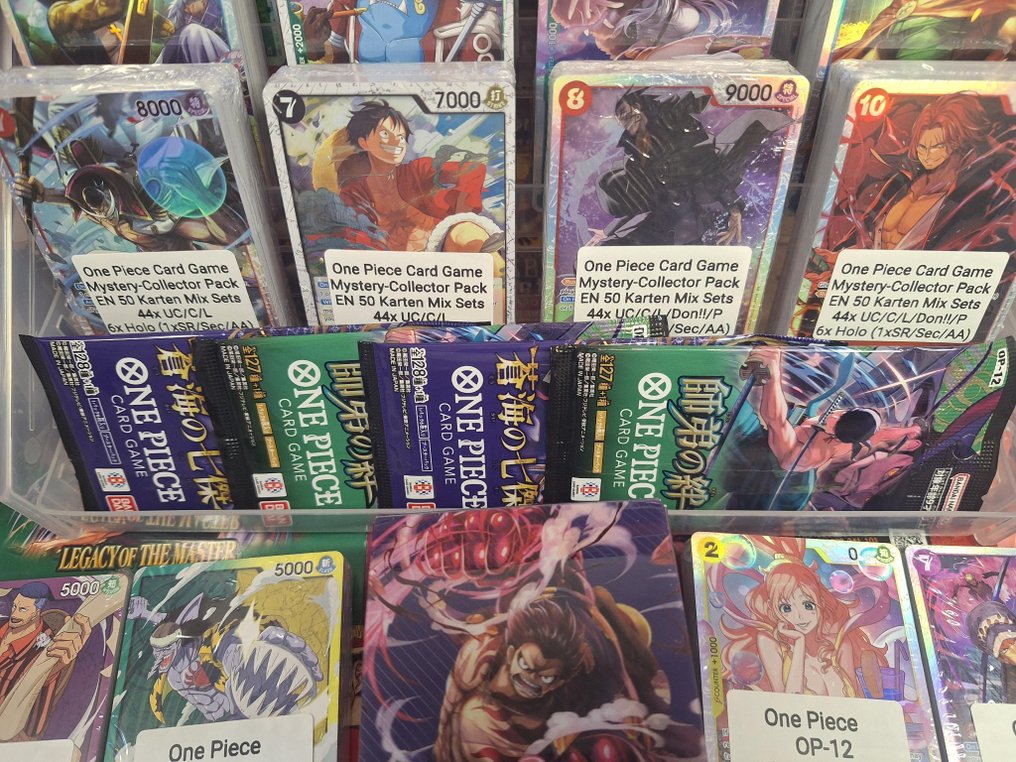 Bandai - 2000 Card - One Piece - Monkey D. Luffy Elite Collector Bundle: 40 Packs + 2 Tins + King Kong Gun Deckbox #3.2